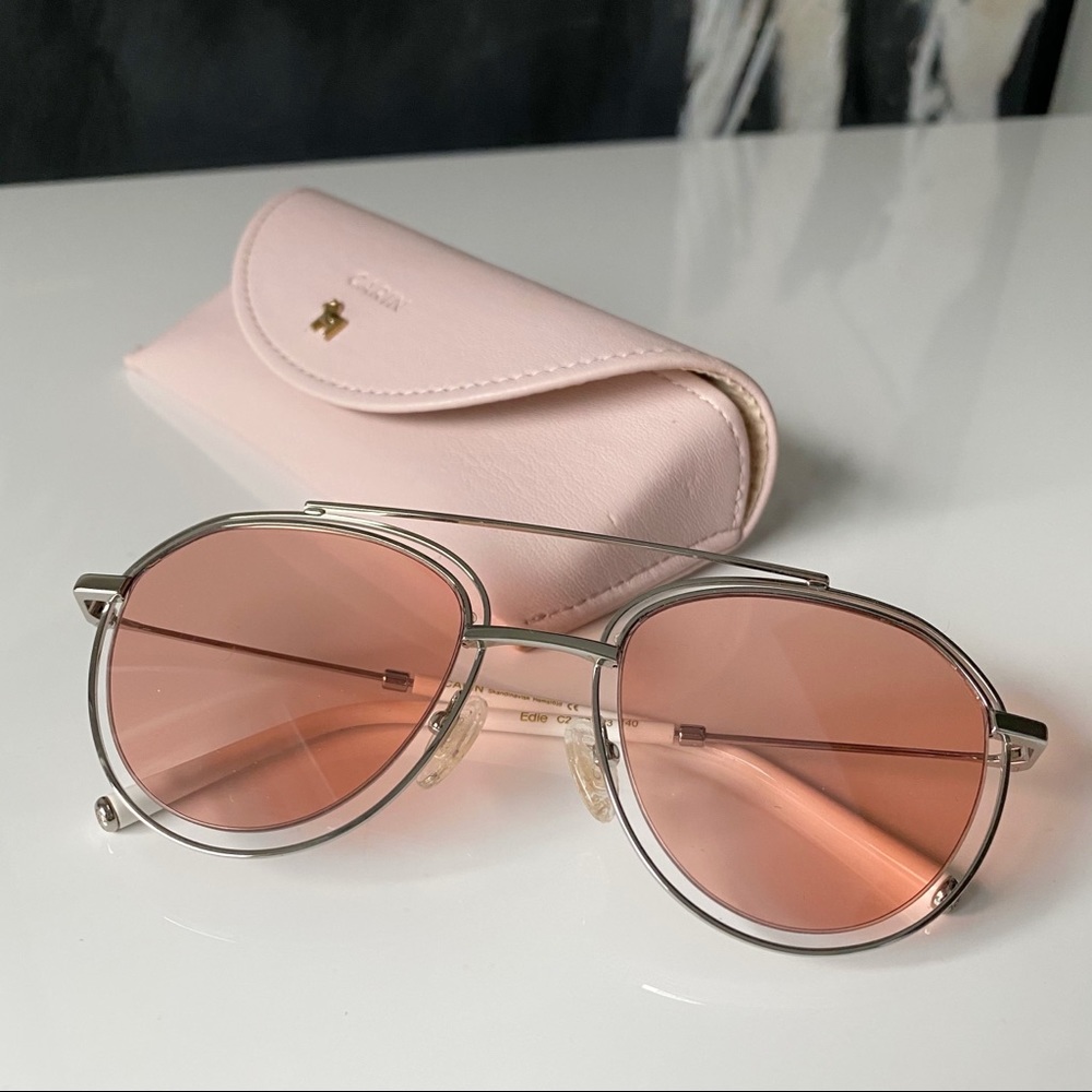 pink lens, white, silver band designer sunglasses